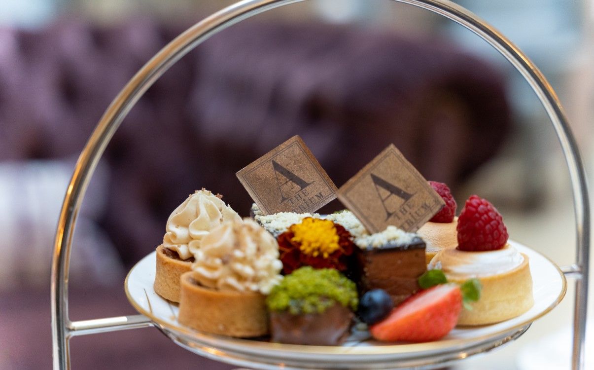 Various small desserts with cream and fruit in The College Green Hotel Dublin