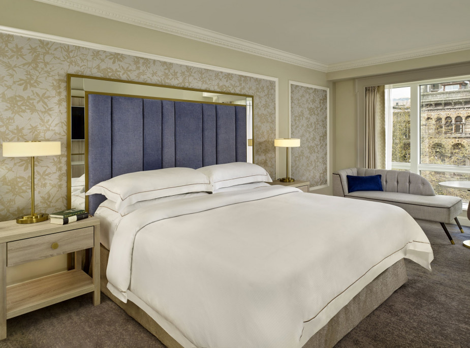 Deluxe king room curtains open The College Green Hotel