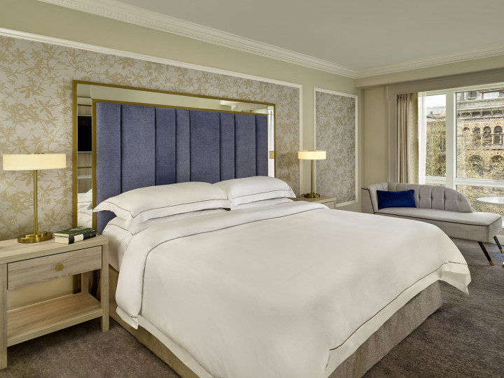 Deluxe king room curtains open The College Green Hotel